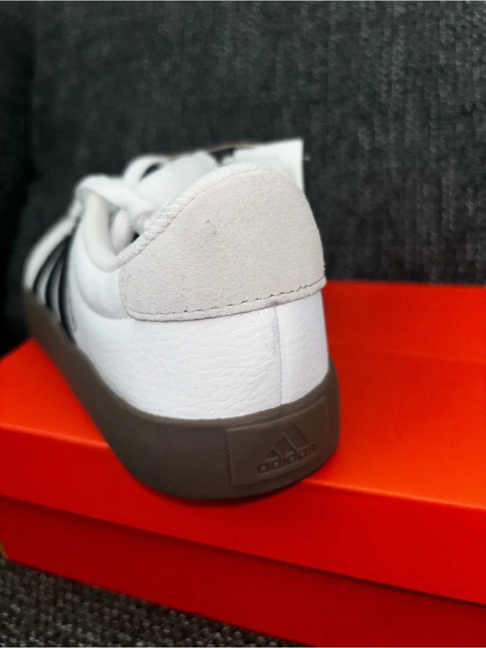 Adidas unisex White Sneaker with Black Stripes